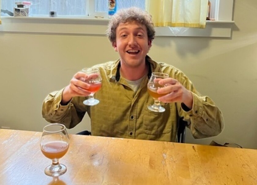 UC Santa Cruz student and avid homebrewer Thomas Mahady with some of his kombucha